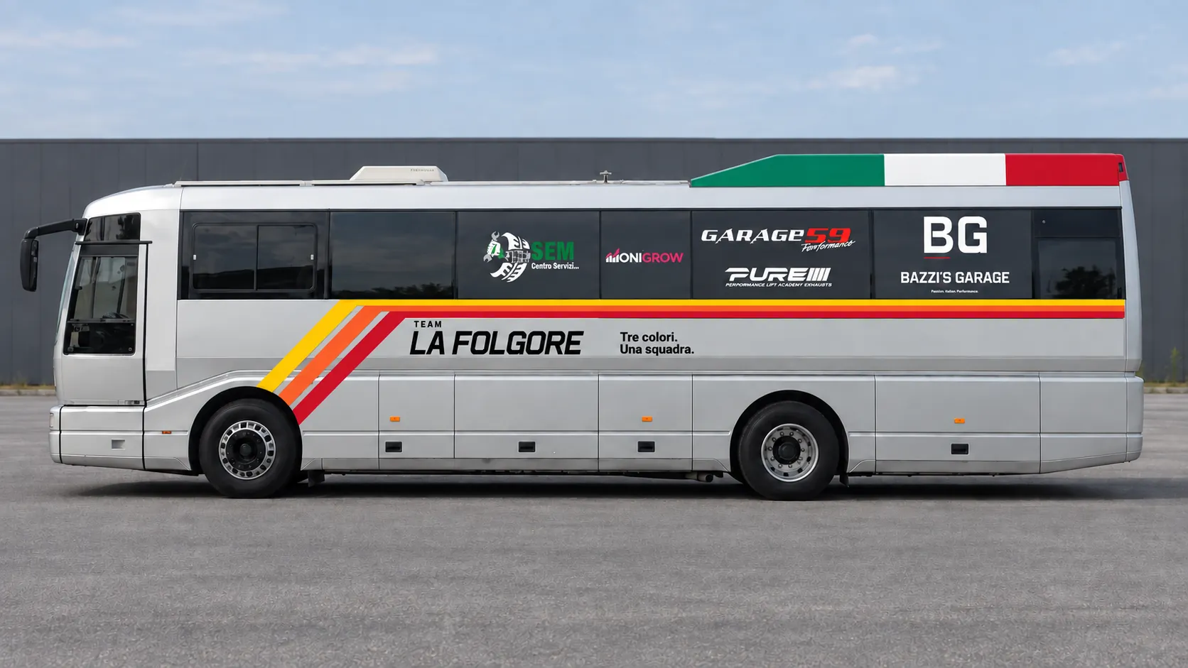 Full side view of the Bazzi’s Garage coach.